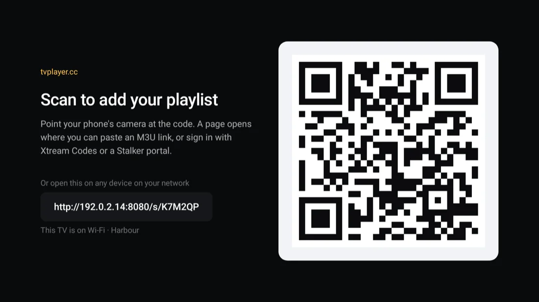 The television showing a QR code for adding a playlist.